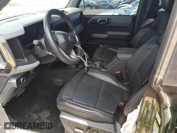 2023 Ford Bronco with VIN 1FMEE5DP9PLB29838, listed as a Copart auction lot 62409785 with 11,124 mi miles and Salvage title. Bid and sale history available at DreamBid. Image 7.