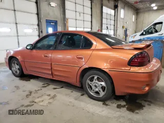 2004 Pontiac Grand Am GT with VIN 1G2NW52E74M652319, listed as a Copart auction lot 44958195 with 197,272 mi miles and Salvage Title. Bid and sale history available at carsss.com. Image 2.