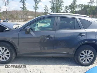 2015 Mazda CX-5 Touring with VIN JM3KE2CY2F0530204, listed as a IAAI auction lot 41788921 with 50,827 mi miles. Bid and sale history available at carsss.com. Image 14.