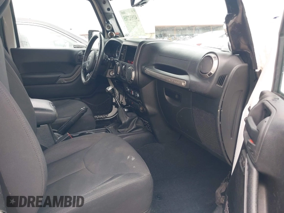 2015 Jeep Wrangler Sport with VIN 1C4AJWAG5FL757161, listed as a IAAI auction lot 41932705 with 172,519 mi miles and . Bid and sale history available at DreamBid. Image 5.