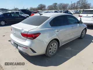 2022 Kia Rio S with VIN 3KPA24AD7NE437841, listed as a IAAI auction lot 41757262 with 34,909 mi miles. Bid and sale history available at carsss.com. Image 4.