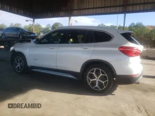 2017 BMW X1 sDrive28i with VIN WBXHU7C31H5H37217, listed as a Copart auction lot 70114342 with 73,683 mi miles. Bid and sale history available at carsss.com. Image 2.