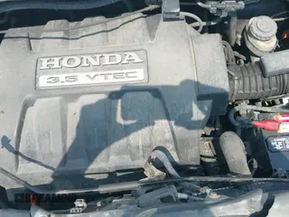 2006 Honda Pilot EX-L with VIN 2HKYF187X6H546017, listed as a IAAI auction lot 42502003 with 190,765 mi miles and . Bid and sale history available at DreamBid. Image 19.