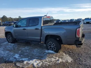 2021 GMC Canyon 4WD AT4 w/Leather with VIN 1GTG6FEN7M1156069, listed as a Copart auction lot 89345225 with 66,164 mi miles and Salvage Title. Bid and sale history available at carsss.com. Image 2.