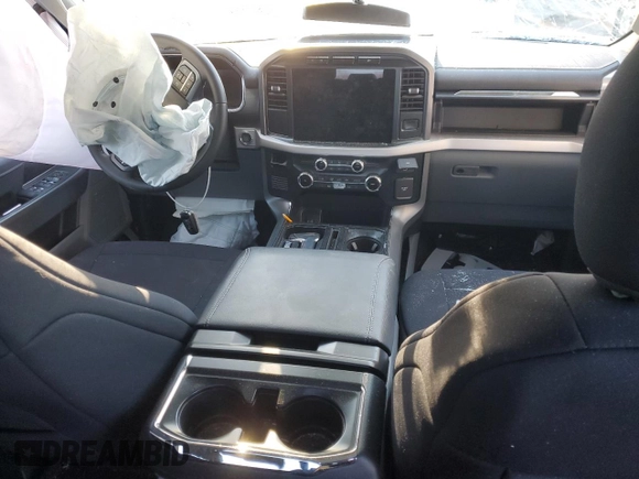 2023 Ford F-150 Lightning Pro z VIN 1FTVW1EL3PWG61686, wystawiony jako Copart lot #87870815 z przebiegiem Nie podano mil oraz Szkoda całkowita • Salvage title. Historia ofert i sprzedaży dostępna na DreamBid. Obrazek 8.