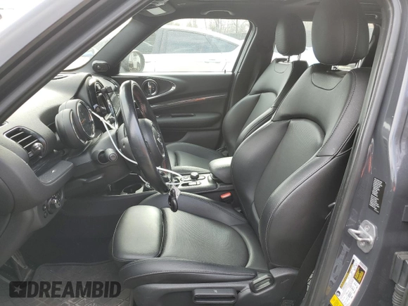 2017 MINI Clubman Cooper S with VIN WMWLU5C57H2E82584, listed as a Copart auction lot 48861365 with 90,418 mi miles and Salvage Title. Bid and sale history available at DreamBid. Image 7.