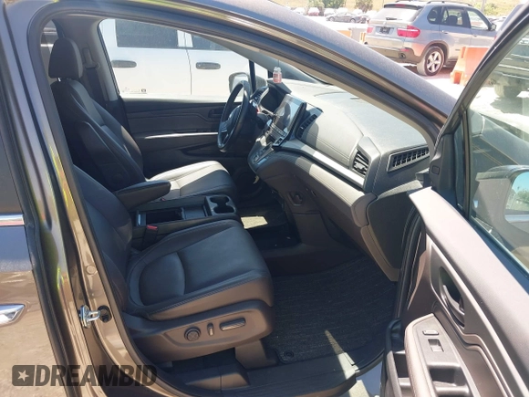 2022 Honda Odyssey EX-L with VIN 5FNRL6H76NB052194, listed as a IAAI auction lot 41889058 with 49,731 mi miles and . Bid and sale history available at DreamBid. Image 5.