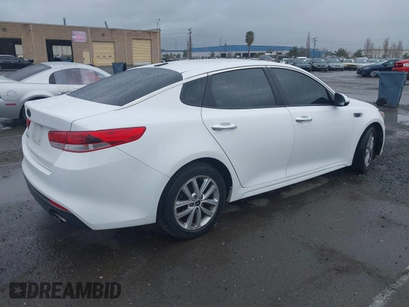 2016 Kia Optima LX with VIN 5XXGT4L30GG049534, listed as a IAAI auction lot 41770579 with 94,257 mi miles. Bid and sale history available at carsss.com. Image 4.