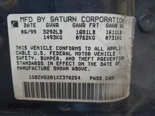 1999 Saturn SL z VIN 1G8ZH5281XZ376254, wystawiony jako IAAI lot #41857372 z przebiegiem 229 836 mil mil oraz . Historia ofert i sprzedaży dostępna na DreamBid. Obrazek 9.