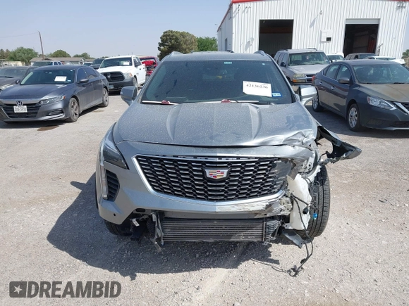 2023 Cadillac XT4 AWD Premium Luxury with VIN 1GYFZDR47PF163923, listed as a IAAI auction lot 42136236 with 52,012 mi miles and . Bid and sale history available at DreamBid. Image 12.