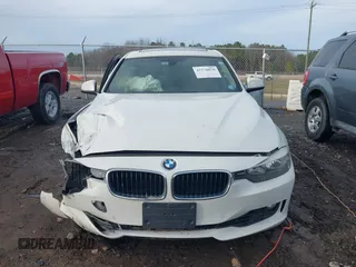2015 BMW 3 Series 328i xDrive with VIN WBA3B5G59FNS19005, listed as a IAAI auction lot 41570070 with 104,666 mi miles. Bid and sale history available at carsss.com. Image 12.