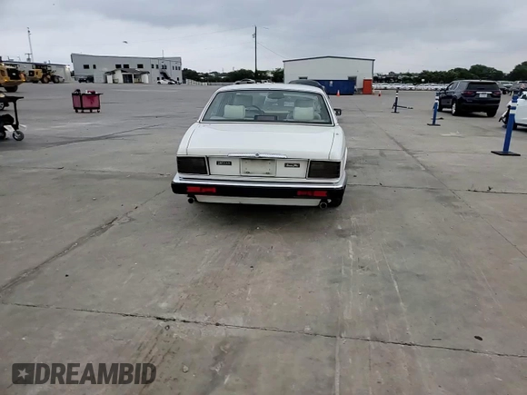 1994 Jaguar XJ with VIN SAJKX1743RC698636, listed as a Copart auction lot 56376685 with 192,928 mi miles and Salvage title. Bid and sale history available at DreamBid. Image 13.