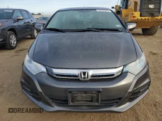 2012 Honda Insight z VIN JHMZE2H32CS000284, wystawiony jako Copart lot #50160335 z przebiegiem 64 074 mil mil oraz Szkoda całkowita • Salvage title. Historia ofert i sprzedaży dostępna na DreamBid. Obrazek 5.