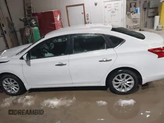 2019 Nissan Sentra S z VIN 3N1AB7APXKY240431, wystawiony jako IAAI lot #41722182 z przebiegiem 81 450 mil mil oraz . Historia ofert i sprzedaży dostępna na DreamBid. Obrazek 14.