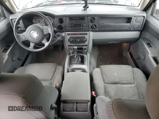 2007 Jeep Commander Sport z VIN 1J8HG48K97C527502, wystawiony jako Copart lot #52362625 z przebiegiem 156 639 mil mil oraz Czysty tytuł • Clean title. Historia ofert i sprzedaży dostępna na DreamBid. Obrazek 8.