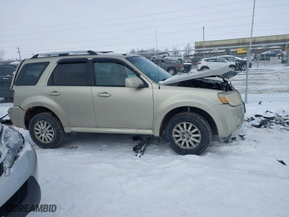 2010 Mercury Mariner Premier with VIN 4M2CN8H72AKJ05699, listed as a IAAI auction lot 41631468 with 205,563 mi miles. Bid and sale history available at carsss.com. Image 13.