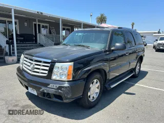 2002 Cadillac Escalade z VIN 1GYEC63T22R113253, wystawiony jako Copart lot #56408115 z przebiegiem 249 604 mil mil oraz Szkody całkowita. Historia ofert i sprzedaży dostępna na DreamBid. Obrazek 2.