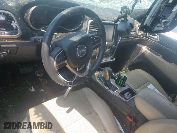 2016 Jeep Grand Cherokee Limited 75th Anniversary with VIN 1C4RJEBG4GC423829, listed as a Copart auction lot 53019705 with 197,353 mi miles and Salvage title. Bid and sale history available at DreamBid. Image 8.