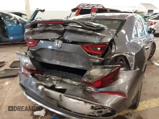 2022 Honda Insight Touring with VIN 19XZE4F96NE008687, listed as a IAAI auction lot 41653624 with 32,663 mi miles and . Bid and sale history available at DreamBid. Image 6.
