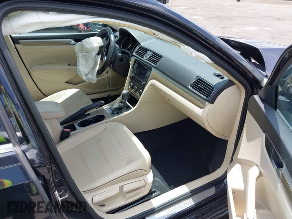 2017 Volkswagen Passat SE with VIN 1VWGT7A32HC034410, listed as a IAAI auction lot 42470146 with 96,226 mi miles and . Bid and sale history available at DreamBid. Image 5.