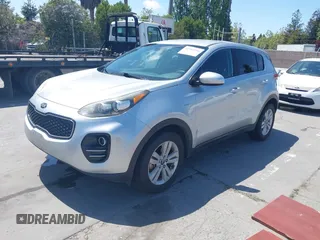 2017 Kia Sportage LX with VIN KNDPMCAC8H7130334, listed as a IAAI auction lot 42184166 with 128,364 mi miles and . Bid and sale history available at carsss.com. Image 2.