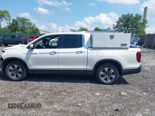 2019 Honda Ridgeline RTL-E with VIN 5FPYK3F71KB017906, listed as a IAAI auction lot 42670476 with 58,288 mi miles and . Bid and sale history available at DreamBid. Image 15.