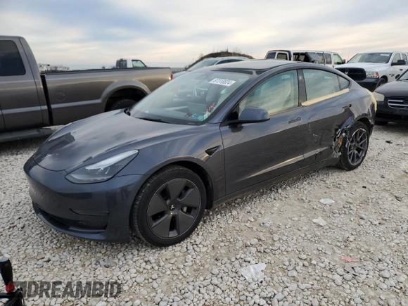2022 Tesla Model 3 Long Range with VIN 5YJ3E1EB0NF269249, listed as a Copart auction lot 87318524 with 18,406 mi miles and Salvage Title. Bid and sale history available at DreamBid. Image 1.