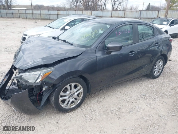 2017 Toyota Yaris iA with VIN 3MYDLBYV3HY180033, listed as a IAAI auction lot 41879810 with 133,933 mi miles. Bid and sale history available at carsss.com. Image 23.