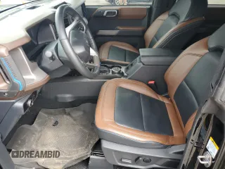 2023 Ford Bronco with VIN 1FMDE5DH0PLB09207, listed as a Copart auction lot 51827984 with 19,766 mi miles and Salvage Title. Bid and sale history available at carsss.com. Image 7.
