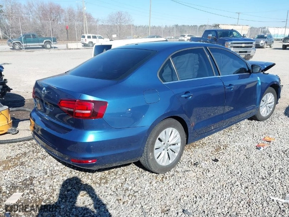 2017 Volkswagen Jetta 1.4T S with VIN 3VW2B7AJ5HM317846, listed as a IAAI auction lot 41755207 with 128,318 mi miles. Bid and sale history available at carsss.com. Image 4.