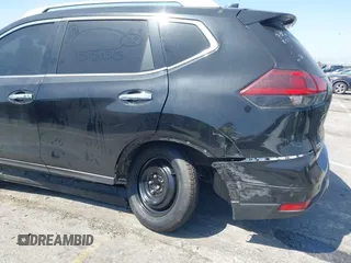 2019 Nissan Rogue SV with VIN KNMAT2MT8KP506083, listed as a IAAI auction lot 41965304 with 99,872 mi miles and . Bid and sale history available at DreamBid. Image 6.
