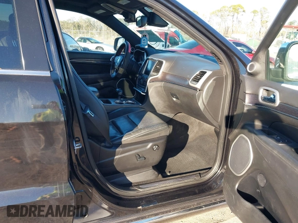 2014 Jeep Grand Cherokee Summit with VIN 1C4RJEJG1EC130727, listed as a IAAI auction lot 41269066 with 205,914 mi miles and . Bid and sale history available at DreamBid. Image 5.