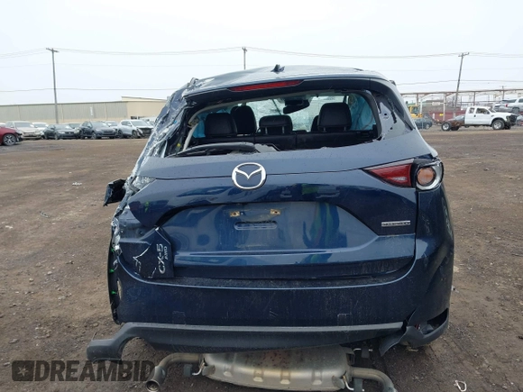 2020 Mazda CX-5 Touring with VIN JM3KFBCM9L0799502, listed as a IAAI auction lot 42007207 with 43,364 mi miles. Bid and sale history available at carsss.com. Image 15.