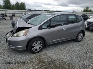 2009 Honda Fit with VIN JHMGE88259S064913, listed as a Copart auction lot 62710225 with 138,235 mi miles and Salvage title. Bid and sale history available at DreamBid. Image 1.