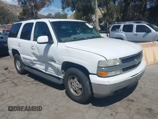 2002 Chevrolet Tahoe LS z VIN 1GNEC13T22R232615, wystawiony jako IAAI lot #41965606 z przebiegiem 199 202 mil mil oraz . Historia ofert i sprzedaży dostępna na DreamBid. Obrazek 1.