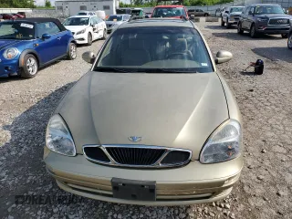 2000 Daewoo Nubira CDX z VIN KLAJB82Z2YK536836, wystawiony jako Copart lot #55621465 z przebiegiem 58 133 mil mil oraz Szkody całkowita. Historia ofert i sprzedaży dostępna na DreamBid. Obrazek 5.