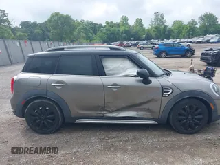 2018 MINI Countryman Cooper z VIN WMZYV5C39J3E02982, wystawiony jako IAAI lot #42384795 z przebiegiem 74 599 mil mil oraz . Historia ofert i sprzedaży dostępna na DreamBid. Obrazek 13.