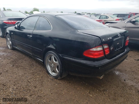 1999 Mercedes-Benz CLK-Class with VIN WDBLJ70G7XF076420, listed as a Copart auction lot 54039344 with 76,453 mi miles and Salvage Title. Bid and sale history available at carsss.com. Image 2.