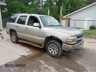 2001 Chevrolet Tahoe LT z VIN 1GNEK13T01R128643, wystawiony jako IAAI lot #42286231 z przebiegiem 186 852 mil mil oraz . Historia ofert i sprzedaży dostępna na DreamBid. Obrazek 1.