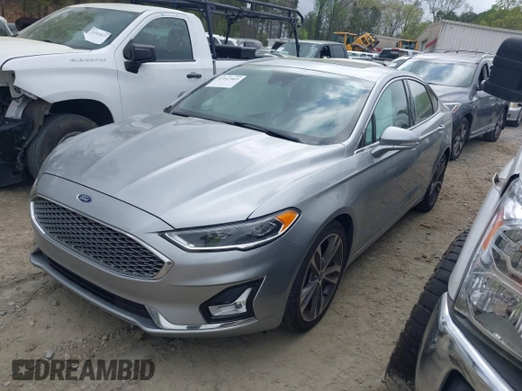 2020 Ford Fusion Titanium с VIN 3FA6P0K91LR128016, выставлен на аукционе IAAI как лот 41947905 с пробегом 79 622 миль миль и . История ставок и продаж доступна на DreamBid. Изображение 17.