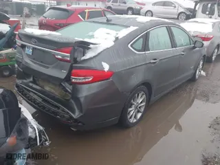 2017 Ford Fusion Energi SE with VIN 3FA6P0PU6HR203037, listed as a IAAI auction lot 41567334 with 96,852 mi miles. Bid and sale history available at carsss.com. Image 4.