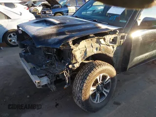 2016 Toyota Tacoma SR with VIN 3TMCZ5AN0GM023263, listed as a IAAI auction lot 41302069 with 137,276 mi miles and . Bid and sale history available at DreamBid. Image 6.