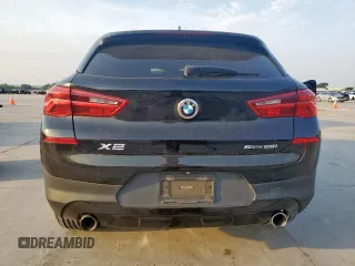 2018 BMW X2 sDrive28i z VIN WBXYJ3C3XJEJ75614, wystawiony jako Copart lot #57208145 z przebiegiem 94 014 mil mil oraz Tytuł czysty. Historia ofert i sprzedaży dostępna na DreamBid. Obrazek 6.