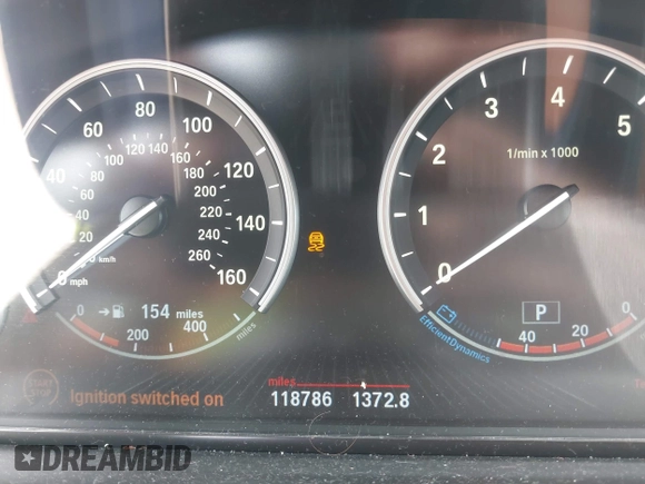 2013 BMW 5 Series 528i xDrive z VIN WBAXH5C57DD111765, wystawiony jako IAAI lot #42293035 z przebiegiem 118 786 mil mil oraz . Historia ofert i sprzedaży dostępna na DreamBid. Obrazek 7.