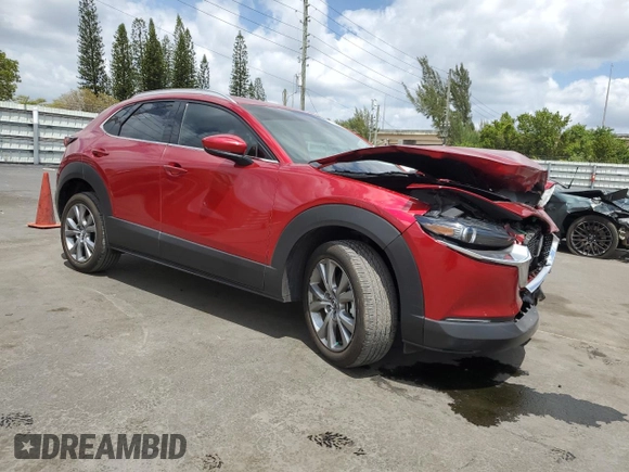 2023 Mazda CX-30 2.5 S Premium Package with VIN 3MVDMBDM0PM504875, listed as a Copart auction lot 53675505 with 8,245 mi miles and Salvage Title. Bid and sale history available at carsss.com. Image 4.
