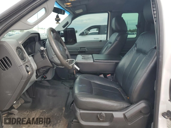 2012 Ford F-250 XL with VIN 1FT7X2A61CEC15533, listed as a Copart auction lot 57883444 with 195,030 mi miles and Salvage title. Bid and sale history available at DreamBid. Image 7.