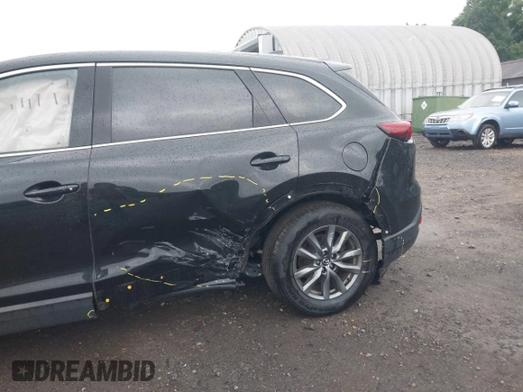 2020 Mazda CX-9 Touring with VIN JM3TCBCY5L0422262, listed as a IAAI auction lot 42456246 with 69,211 mi miles and . Bid and sale history available at DreamBid. Image 6.