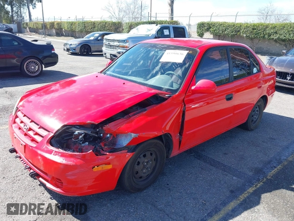 2003 Hyundai Accent GL with VIN KMHCG45C93U487209, listed as a IAAI auction lot 41590636 with 118,811 mi miles. Bid and sale history available at carsss.com. Image 2.
