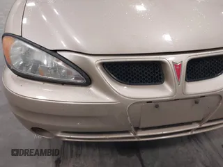 2003 Pontiac Grand Am SE1 with VIN 1G2NF52EX3C104710, listed as a IAAI auction lot 42053621 with 102,012 mi miles. Bid and sale history available at carsss.com. Image 6.
