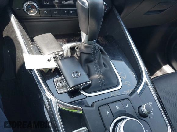 2023 Mazda CX-9 Touring Plus with VIN JM3TCBAY7P0636047, listed as a IAAI auction lot 42309618 with 20,821 mi miles and . Bid and sale history available at DreamBid. Image 11.